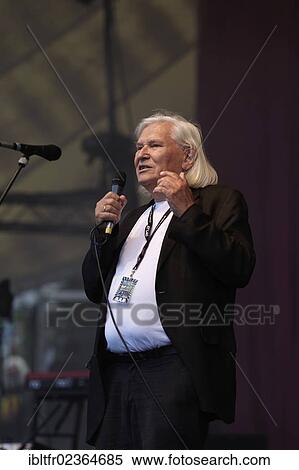 "Peter Ruchel, music journalist and founder of the WDR programme """"Rockpalast"""", on stage during the final concert of the BAP tour, Loreley open air stage, St. Goarshausen, Rhineland-Palatinate, Germany, Europe" View Large Photo Image Stock Photography - "Peter Ruchel, music journalist and founder of the WDR programme """"Rockpalast"""", on stage during the final concert of the BAP tour, Loreley open air stage, St. Goarshausen, Rhineland-Palatinate, Germany, Europe". Fotosearch