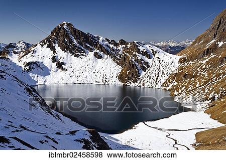 "Pfunderer Mountains, Lake Wilde, looking towards Kalkgrubenspitz Mountain, Alto Adige, Italy, Europe" View Large Photo Image Stock Photo - "Pfunderer Mountains, Lake Wilde, looking towards Kalkgrubenspitz Mountain, Alto Adige, Italy, Europe". Fotosearch