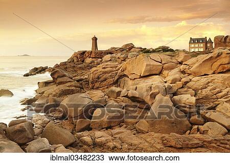Stock Image - "Phare de Ploumanac'h or Phare de Mean Ruz lighthouse on the Cote de Granit Rose or Pink Granite Coast, Ploumanacâ€™h, Brittany, France, Europe". Fotosearch