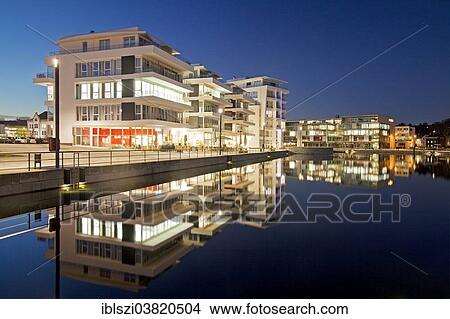 Picture - "Phoenix Lake with the Facharztzentrum medical centre at the blue hour, Dortmund, North Rhine-Westphalia, Germany, Europe". Fotosearch