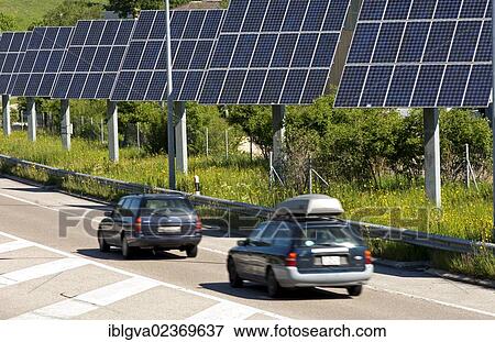 "Photovoltaic modules along a country road in the Swiss Jura near La-Chaux-de-Fonds, Canton of Neuchatel, Switzerland, Europe" View Large Photo Image Stock Photo - "Photovoltaic modules along a country road in the Swiss Jura near La-Chaux-de-Fonds, Canton of Neuchatel, Switzerland, Europe". Fotosearch