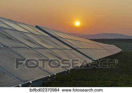 Picture - "Photovoltaic power plant, at sunrise, Nentmannsdorf, Saxony, Germany, Europe". Fotosearch