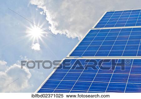 "Photovoltaic power plants against blue sky with clouds and bright sun, Nentmannsdorf, Saxony, Germany, Europe" View Large Photo Image Stock Photography - "Photovoltaic power plants against blue sky with clouds and bright sun, Nentmannsdorf, Saxony, Germany, Europe". Fotosearch