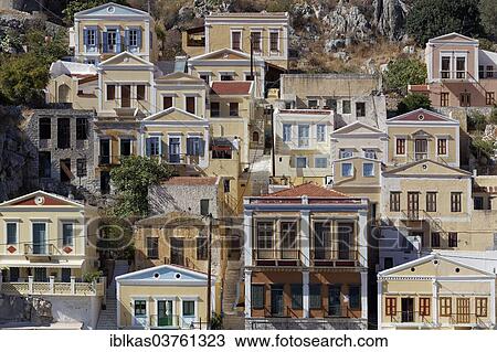 "Picturesque houses in the neo-classical style, town of Symi, Symi Island, Dodecanese, Greece, Europe" View Large Photo Image Stock Image - "Picturesque houses in the neo-classical style, town of Symi, Symi Island, Dodecanese, Greece, Europe". Fotosearch