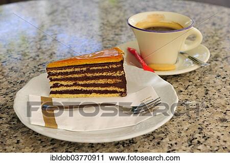 "Piece of cake and cup of coffee, Cafe Gerbeaud, Budapest, Hungary, Europe" View Large Photo Image Stock Image - "Piece of cake and cup of coffee, Cafe Gerbeaud, Budapest, Hungary, Europe". Fotosearch