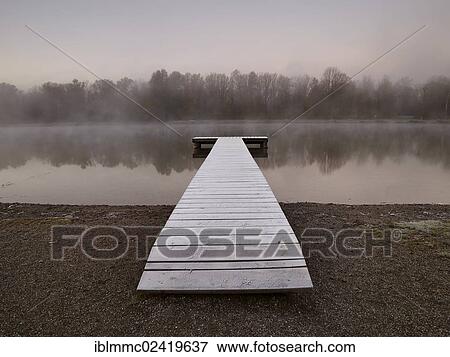 Pier in Kuhsee lake, Augsburg, Swabia, Bavaria, Germany, Europe View Large Photo Image Stock Photo - Pier in Kuhsee lake, Augsburg, Swabia, Bavaria, Germany, Europe. Fotosearch
