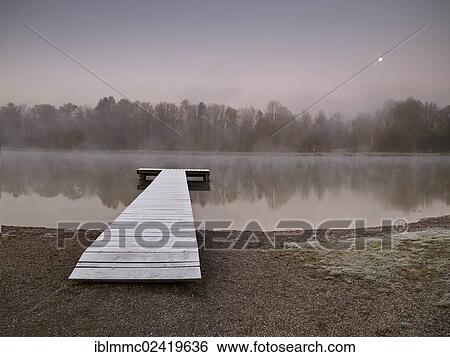 Pier in Kuhsee lake, Augsburg, Swabia, Bavaria, Germany, Europe View Large Photo Image Stock Photograph - Pier in Kuhsee lake, Augsburg, Swabia, Bavaria, Germany, Europe. Fotosearch