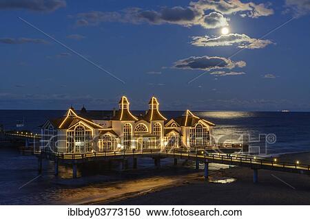 "Pier in Sellin at night with a full moon, Sellin, Ruegen, Mecklenburg-Western Pomerania, Germany, Europe" View Large Photo Image Stock Image - "Pier in Sellin at night with a full moon, Sellin, Ruegen, Mecklenburg-Western Pomerania, Germany, Europe". Fotosearch
