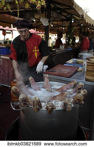 "Pigs' feet boiling in a large pot at the annual All Saints Market in Cocentaina, Alicante province, Spain, Europe" View Large Photo Image Stock Photo - "Pigs' feet boiling in a large pot at the annual All Saints Market in Cocentaina, Alicante province, Spain, Europe". Fotosearch