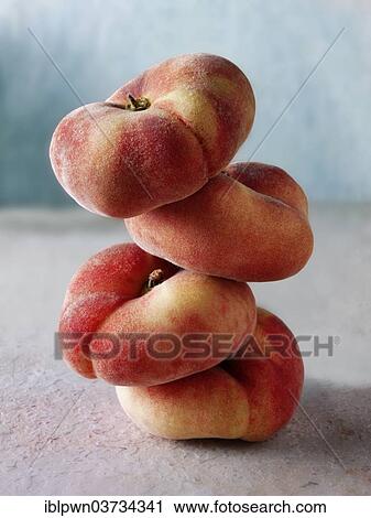 Pile of fresh donut peaches View Large Photo Image Stock Image - Pile of fresh donut peaches. Fotosearch