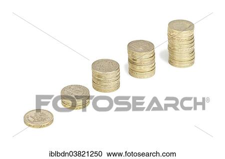 Stock Image - Piles of UK sterling pound coins. Fotosearch