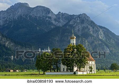 "Pilgrimage church of St. Coloman, Schloss Neuschwanstein Castle at the back, Schwangau, Fussen, Allgau, Swabia, Bavaria, Germany, Europe" View Large Photo Image Stock Image - "Pilgrimage church of St. Coloman, Schloss Neuschwanstein Castle at the back, Schwangau, Fussen, Allgau, Swabia, Bavaria, Germany, Europe". Fotosearch
