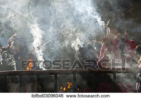 "Pilgrims burning incense as an offering, Dakshinkali Temple or Dakshin Kali Temple, Kathmandu District, Bagmati Zone, Nepal, Asia" View Large Photo Image Stock Photograph - "Pilgrims burning incense as an offering, Dakshinkali Temple or Dakshin Kali Temple, Kathmandu District, Bagmati Zone, Nepal, Asia". Fotosearch