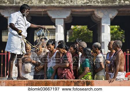 "Pilgrims during ritual ablutions, Ramanathaswami Temple, Rameswaram, Pamban Island, Tamil Nadu, India, Asia" View Large Photo Image Stock Photo - "Pilgrims during ritual ablutions, Ramanathaswami Temple, Rameswaram, Pamban Island, Tamil Nadu, India, Asia". Fotosearch