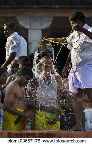 "Pilgrims during ritual ablutions, Ramanathaswami Temple, Rameswaram, Pamban Island, Tamil Nadu, India, Asia" View Large Photo Image Stock Photography - "Pilgrims during ritual ablutions, Ramanathaswami Temple, Rameswaram, Pamban Island, Tamil Nadu, India, Asia". Fotosearch