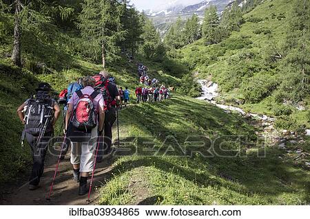 "Pilgrims in Seidlwinkltal, Grossglockner pilgrimage from Fisch and Rauris to Heiligenblut, Carinthia, to St. Peter and Paul, Salzburg State, Austria, Europe" View Large Photo Image Stock Photography - "Pilgrims in Seidlwinkltal, Grossglockner pilgrimage from Fisch and Rauris to Heiligenblut, Carinthia, to St. Peter and Paul, Salzburg State, Austria, Europe". Fotosearch
