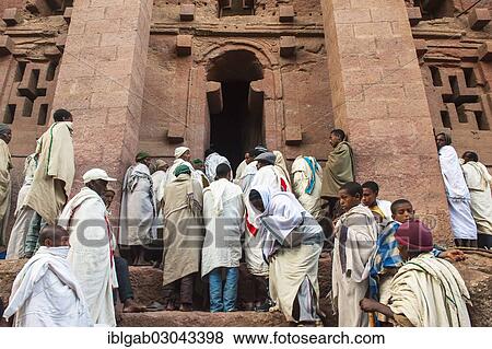 "Pilgrims wearing a traditional white shawl attending a ceremony at the Bete Medhane Alem Church, UNESCO World Heritage Site, Lalibela, Amhara Region, Ethiopia, Africa" View Large Photo Image Stock Photo - "Pilgrims wearing a traditional white shawl attending a ceremony at the Bete Medhane Alem Church, UNESCO World Heritage Site, Lalibela, Amhara Region, Ethiopia, Africa". Fotosearch