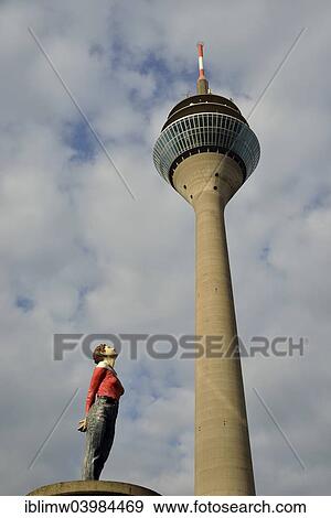 "Pillar Saint Marlis by the artist Christoph Poggeler, on advertising column, Rheinturm, Dusseldorf, North Rhine-Westphalia, Germany, Europe" View Large Photo Image Stock Photo - "Pillar Saint Marlis by the artist Christoph Poggeler, on advertising column, Rheinturm, Dusseldorf, North Rhine-Westphalia, Germany, Europe". Fotosearch