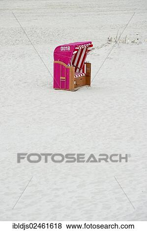 Stock Photo - "Pink beach chair, Norddorf, Amrum, North Frisian Islands, Schleswig-Holstein, Germany, Europe". Fotosearch