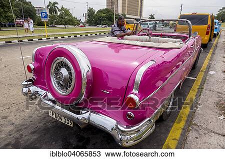 "Pink convertible taxi, old American road cruiser, Havana, Cuba, North America" View Large Photo Image Stock Image - "Pink convertible taxi, old American road cruiser, Havana, Cuba, North America". Fotosearch