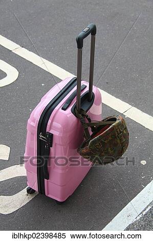 "Pink suitcase with a combat helmet of the German armed forces, Germany, Europe" View Large Photo Image Stock Photography - "Pink suitcase with a combat helmet of the German armed forces, Germany, Europe". Fotosearch