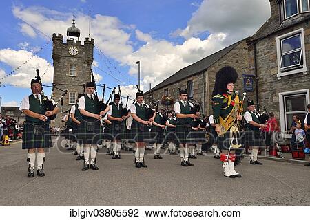 "Pipe major leading a pipe band, stationary in front of the clock tower in the town centre, Dufftown, Moray, Highlands, Scotland, United Kingdom, Europe" View Large Photo Image Stock Image - "Pipe major leading a pipe band, stationary in front of the clock tower in the town centre, Dufftown, Moray, Highlands, Scotland, United Kingdom, Europe". Fotosearch
