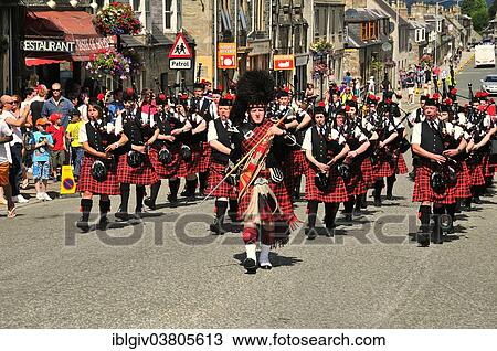 "Pipe major leading a pipe band marching in unison through the town, Dufftown, Moray, Highlands, Scotland, United Kingdom, Europe" View Large Photo Image Stock Image - "Pipe major leading a pipe band marching in unison through the town, Dufftown, Moray, Highlands, Scotland, United Kingdom, Europe". Fotosearch