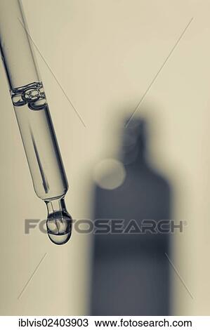 Stock Image - Pipette and bottle. Fotosearch