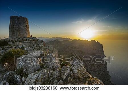"Pirates' Tower or watch tower, mountains and sea, sunset, Cap Formentor, Pollenca, Majorca, Balearic Islands, Spain, Europe" View Large Photo Image Stock Image - "Pirates' Tower or watch tower, mountains and sea, sunset, Cap Formentor, Pollenca, Majorca, Balearic Islands, Spain, Europe". Fotosearch