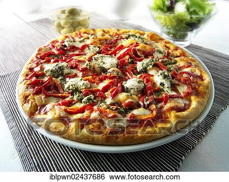 "Pizza topped with pesto, chicken and red peppers" View Large Photo Image Stock Photograph - "Pizza topped with pesto, chicken and red peppers". Fotosearch