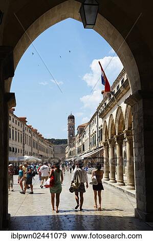 Stock Photo - "Placa, Stradun, Main street in Dubrovnik looking through main gate towards the bell tower, Croatia, Europe". Fotosearch
