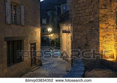 Stock Image - "Place du Marche-aux-Oies or Geesemarket square, Sarlat-la-Caneda, Perigord Noir, Dordogne, Aquitaine, France, Europe". Fotosearch