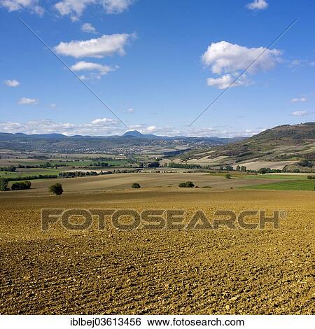 "Plain of Limagne, chain of volcanoes at back, Limagne, Auvergne, France, Europe" View Large Photo Image Stock Photograph - "Plain of Limagne, chain of volcanoes at back, Limagne, Auvergne, France, Europe". Fotosearch