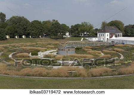 Stock Image - "Planted clarifiers, BernePark, former sewage treatment plant on the Emscher River, Route of Industrial Heritage, Bottrop, Ruhr district, North Rhine-Westphalia, Germany, Europe". Fotosearch