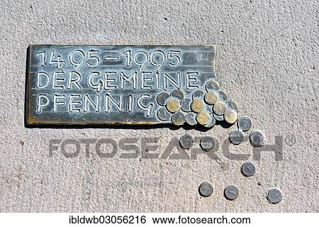 "Plaque """"Der gemeine Pfennig"""" German for """"the common penny"""", story of the penny coin, wheel of fortune of the town of Worms by G. Nonnenmacher, 1986, at Obermarkt square, Worms, Rhineland-Palatinate, Germany, Europe" View Large Photo Image Stock Photograph - "Plaque """"Der gemeine Pfennig"""" German for """"the common penny"""", story of the penny coin, wheel of fortune of the town of Worms by G. Nonnenmacher, 1986, at Obermarkt square, Worms, Rhineland-Palatinate, Germany, Europe". Fotosearch