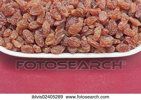 "Plate filled with raisins, sultanas" View Large Photo Image Stock Photo - "Plate filled with raisins, sultanas". Fotosearch