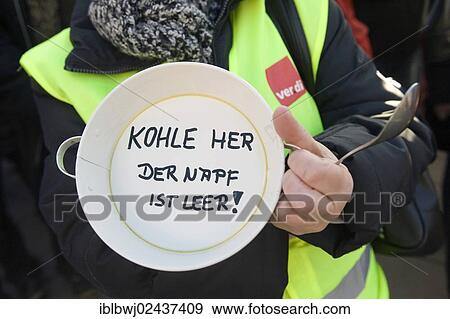 "Plate with the message, Kohle her der Napf ist leer!, German for money here, the bowl is empty, employees' protest with soup in front of the Ministry of Finance, Munich, Bavaria, Germany, Europe" View Large Photo Image Stock Photo - "Plate with the message, Kohle her der Napf ist leer!, German for money here, the bowl is empty, employees' protest with soup in front of the Ministry of Finance, Munich, Bavaria, Germany, Europe". Fotosearch