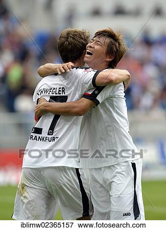 "Players of Eintracht Frankfurt celebrating a goal by Pirmin Schwegler, Takashi Inui, left, Wirsol Rhein-Neckar-Arena, Sinsheim-Hoffenheim, Baden-Wuerttemberg, Germany, Europe" View Large Photo Image Stock Photo - "Players of Eintracht Frankfurt celebrating a goal by Pirmin Schwegler, Takashi Inui, left, Wirsol Rhein-Neckar-Arena, Sinsheim-Hoffenheim, Baden-Wuerttemberg, Germany, Europe". Fotosearch