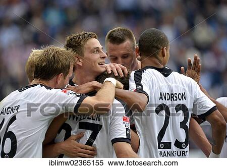 "Players of Eintracht Frankfurt celebrating a goal by Pirmin Schwegler, Wirsol Rhein-Neckar-Arena, Sinsheim-Hoffenheim, Baden-Wuerttemberg, Germany, Europe" View Large Photo Image Stock Photography - "Players of Eintracht Frankfurt celebrating a goal by Pirmin Schwegler, Wirsol Rhein-Neckar-Arena, Sinsheim-Hoffenheim, Baden-Wuerttemberg, Germany, Europe". Fotosearch