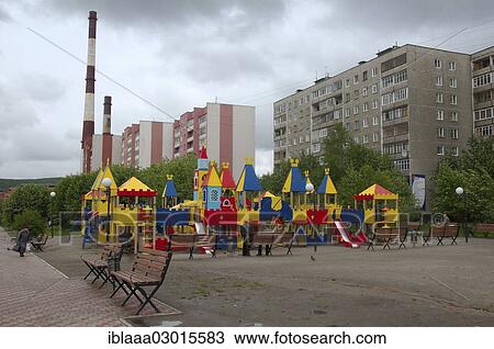 Stock Image - "Playgound in front of apartment blocks, Murmansk, Russia, Europe". Fotosearch