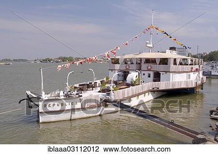 Stock Image - "Pleasure boat on the Danube river, Tulcea, Tulcea County, Romania, Europe". Fotosearch