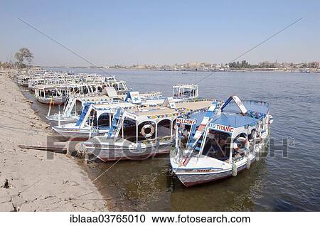 "Pleasure boats, moored, River Nile, Luxor, Egypt, Africa" View Large Photo Image Stock Image - "Pleasure boats, moored, River Nile, Luxor, Egypt, Africa". Fotosearch