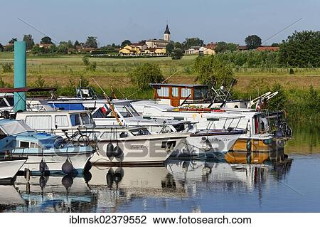 Stock Image - "Pleasure craft in the harbour of Pont-de-Vaux, Rhone-Alpes region, department of Ain, France, Europe". Fotosearch