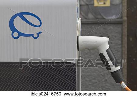 Plug, cable plugged into a charging station for electric cars, North Rhine-Westphalia, Germany, Europe View Large Photo Image Stock Image - Plug, cable plugged into a charging station for electric cars, North Rhine-Westphalia, Germany, Europe. Fotosearch