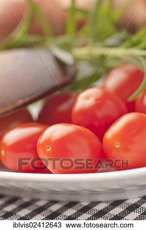 Plum tomatoes on a plate View Large Photo Image Stock Image - Plum tomatoes on a plate. Fotosearch