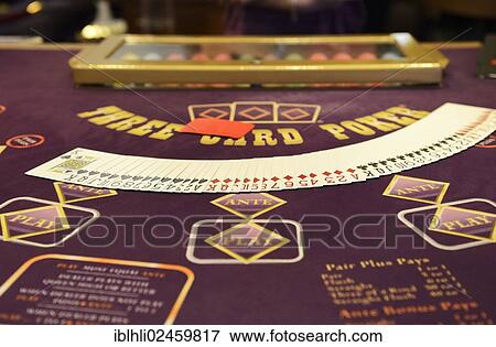 "Poker table with a deck of poker cards, casino" View Large Photo Image Stock Photo - "Poker table with a deck of poker cards, casino". Fotosearch