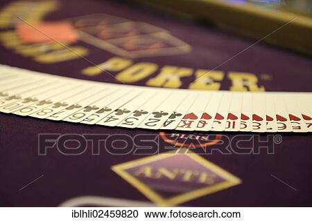 "Poker table with deck of poker cards, casino" View Large Photo Image Stock Image - "Poker table with deck of poker cards, casino". Fotosearch