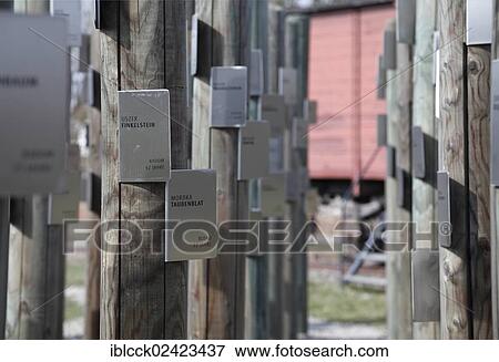 Poles with name tags of Jewish prisoners, a wagon which was used to transport prisoners at the back, Hessental concentration camp, today a memorial place, Schwaebisch Hall, Baden-Wuerttemberg, Germany, Europe View Large Photo Image Stock Photo - Poles with name tags of Jewish prisoners, a wagon which was used to transport prisoners at the back, Hessental concentration camp, today a memorial place, Schwaebisch Hall, Baden-Wuerttemberg, Germany, Europe. Fotosearch