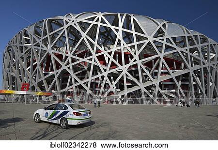 "Police car in front of Beijing Olympic Stadium, National Stadium, Bird's Nest, Olympic Green Olympic Park, Beijing, China, Asia" View Large Photo Image Stock Photo - "Police car in front of Beijing Olympic Stadium, National Stadium, Bird's Nest, Olympic Green Olympic Park, Beijing, China, Asia". Fotosearch