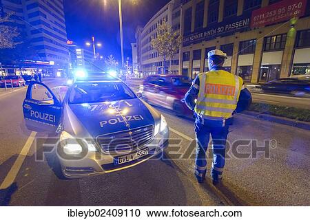 "Police control, police cars with blue lights at night, Theodor-Heuss-Strasse, Stuttgart, Baden-Wuerttemberg, Germany, Europe" View Large Photo Image Stock Image - "Police control, police cars with blue lights at night, Theodor-Heuss-Strasse, Stuttgart, Baden-Wuerttemberg, Germany, Europe". Fotosearch